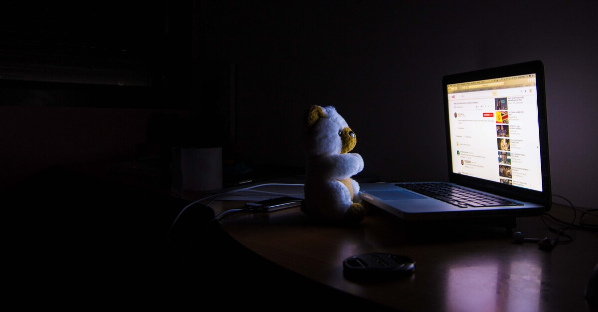 a computer screen in a dark room