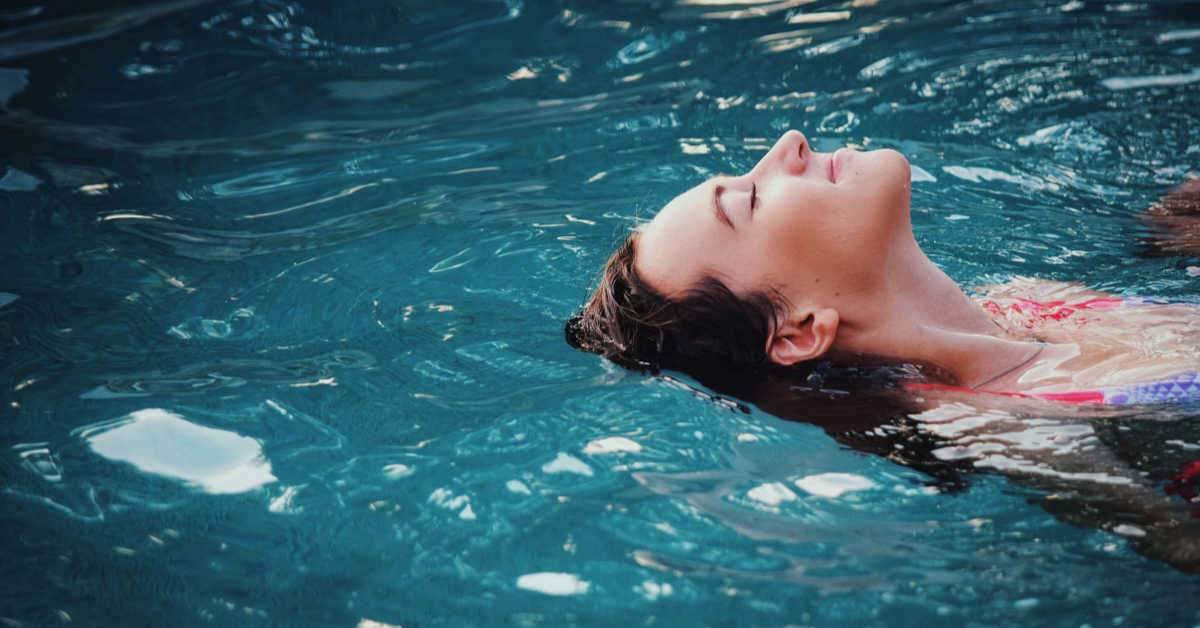 Woman relaxing in pool