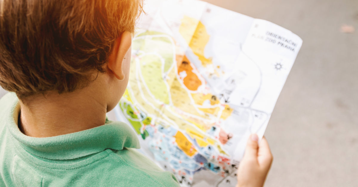 Child holding map