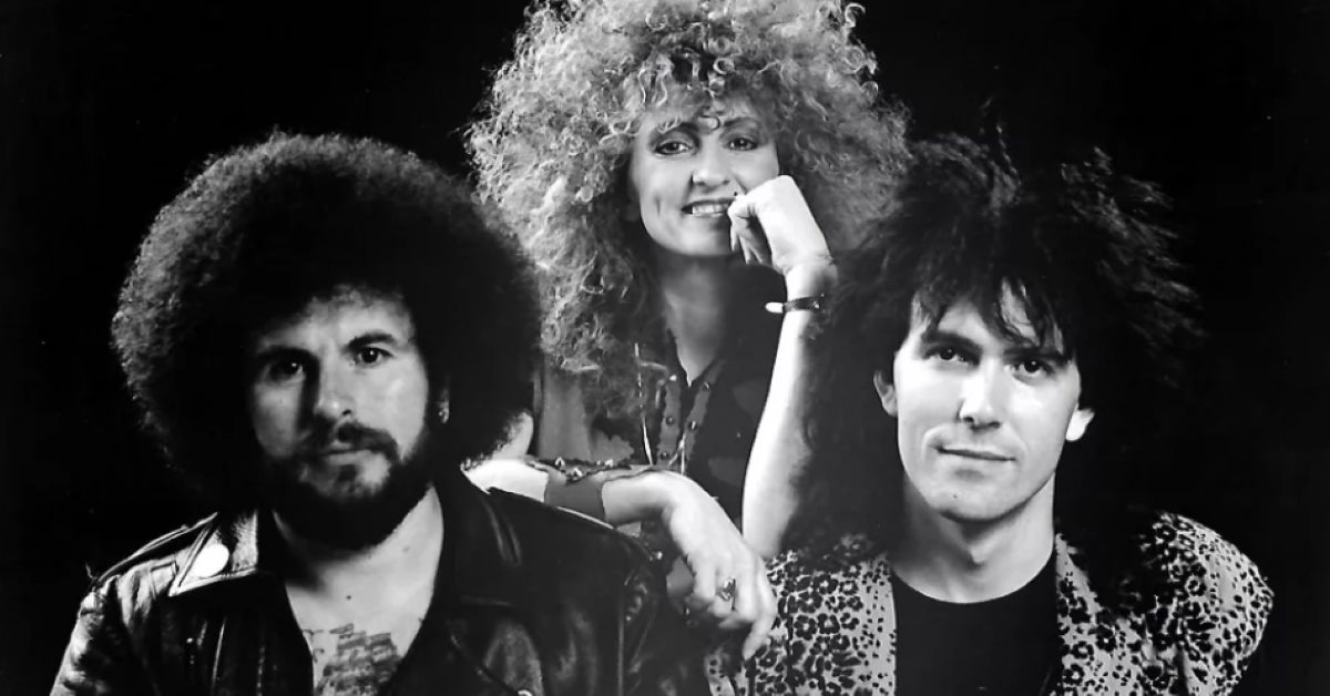 black and white photo of Rosanna's Raiders with big hair circa 1980s