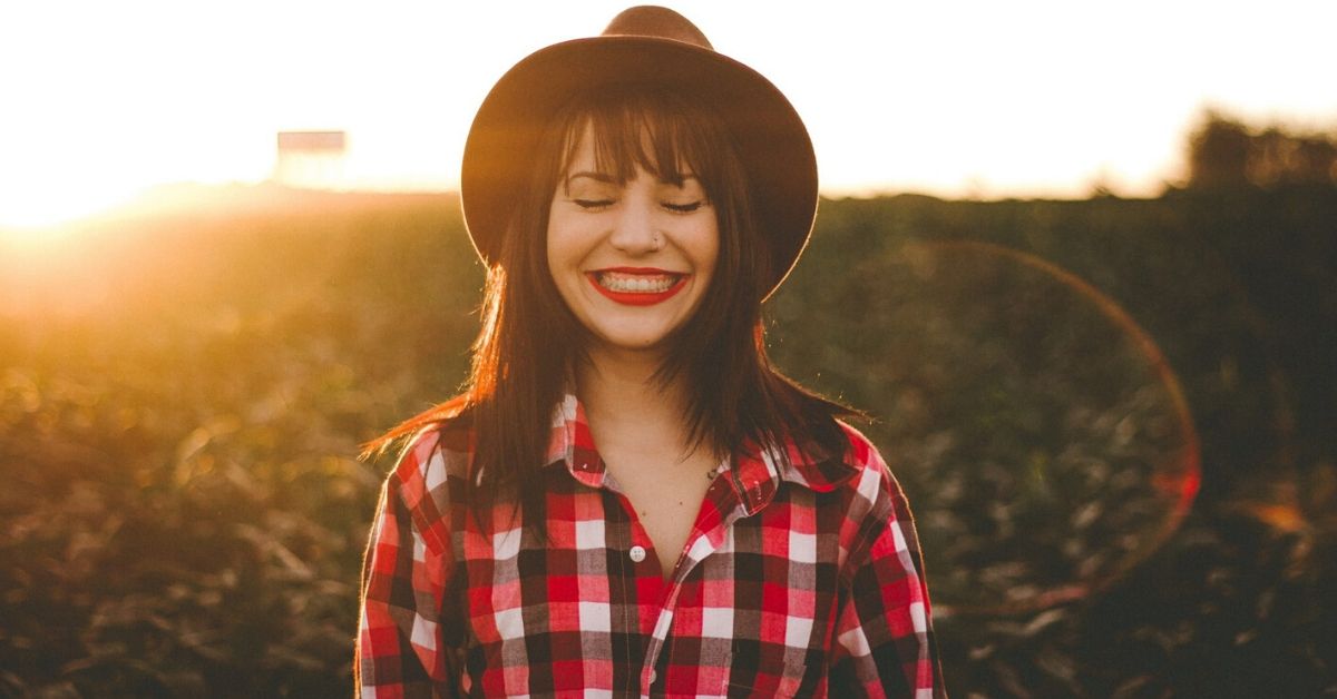 Girl smiling with hair backlit by the sun