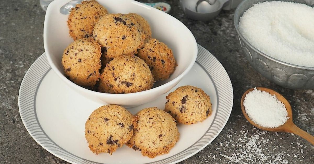 a photo of a bowl of susan joy's choc chip coconut macaroons