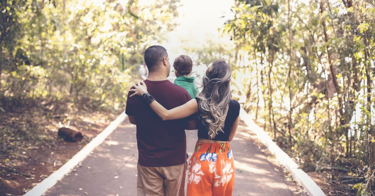 phot of a young family going for a walk