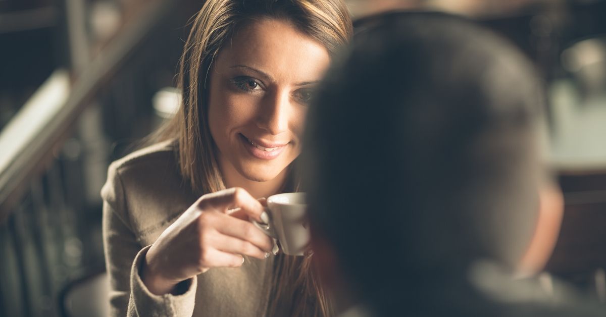 photo of a woman and man having a coffee date