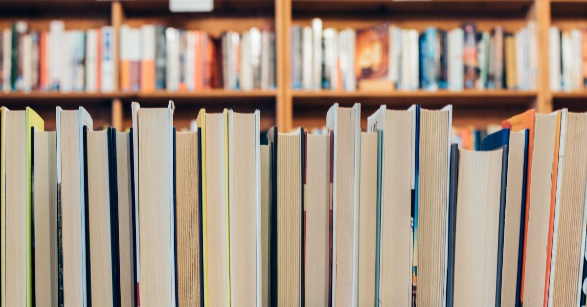 photo depicts books on a bookshelf