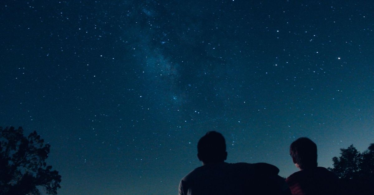 two boys stargazing