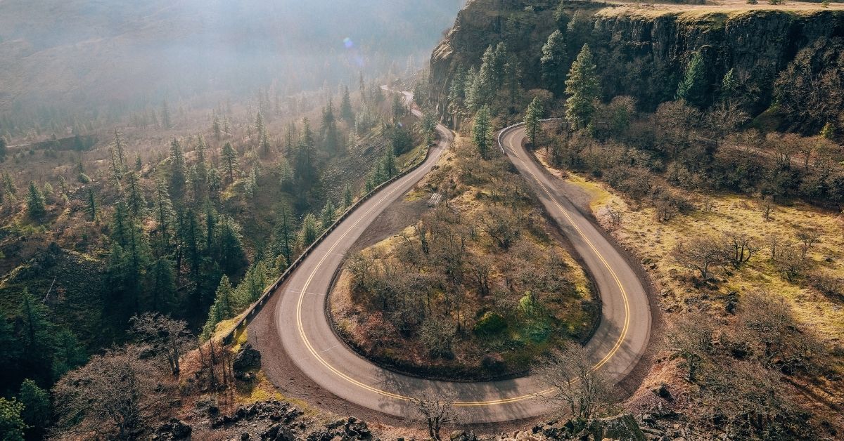 aerial view of a c shaped road