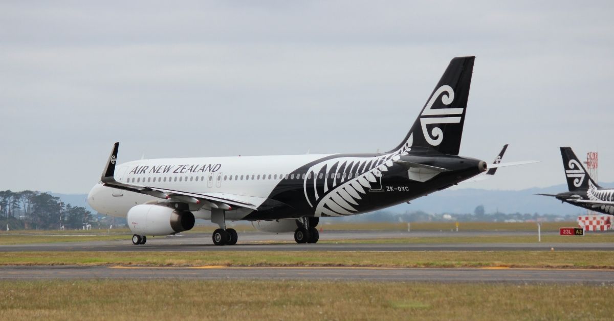 an air new zealand plane on a tarmac