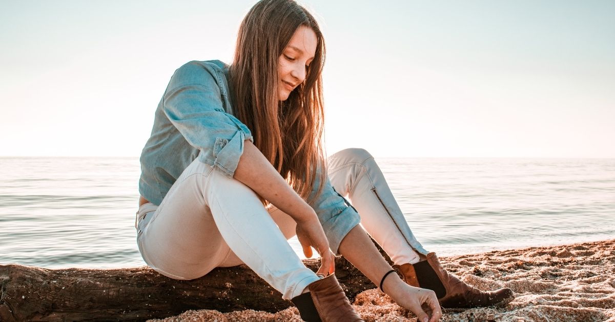 girl sitting on the beach