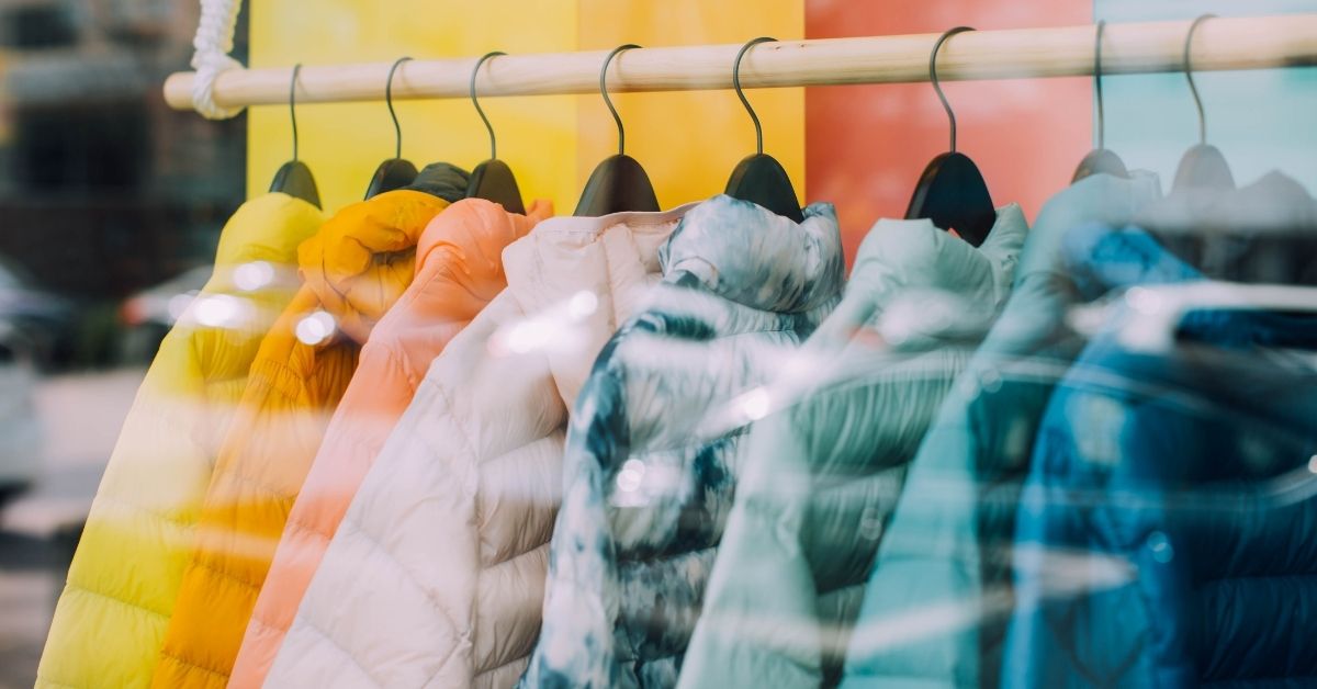 jumpers in a range of colours in a shop window