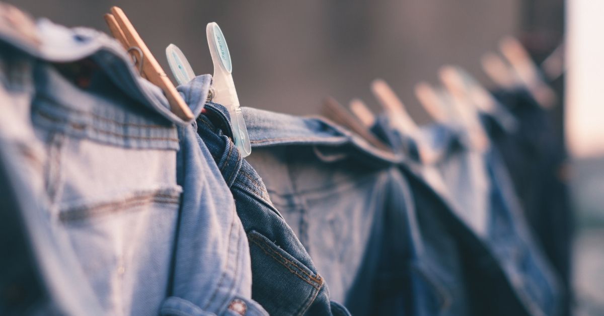 denim jackets hanging on a clothesline