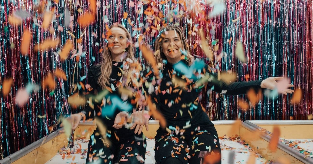 young women with streamers