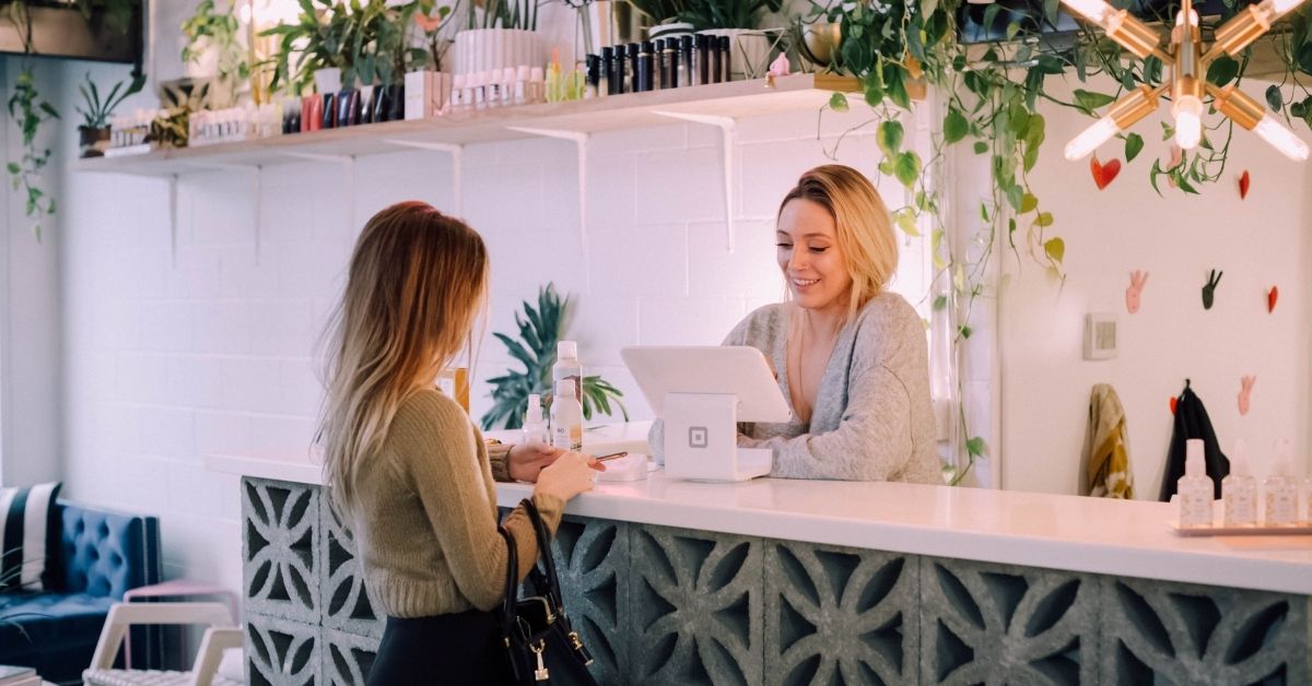 Woman being served at beauticians