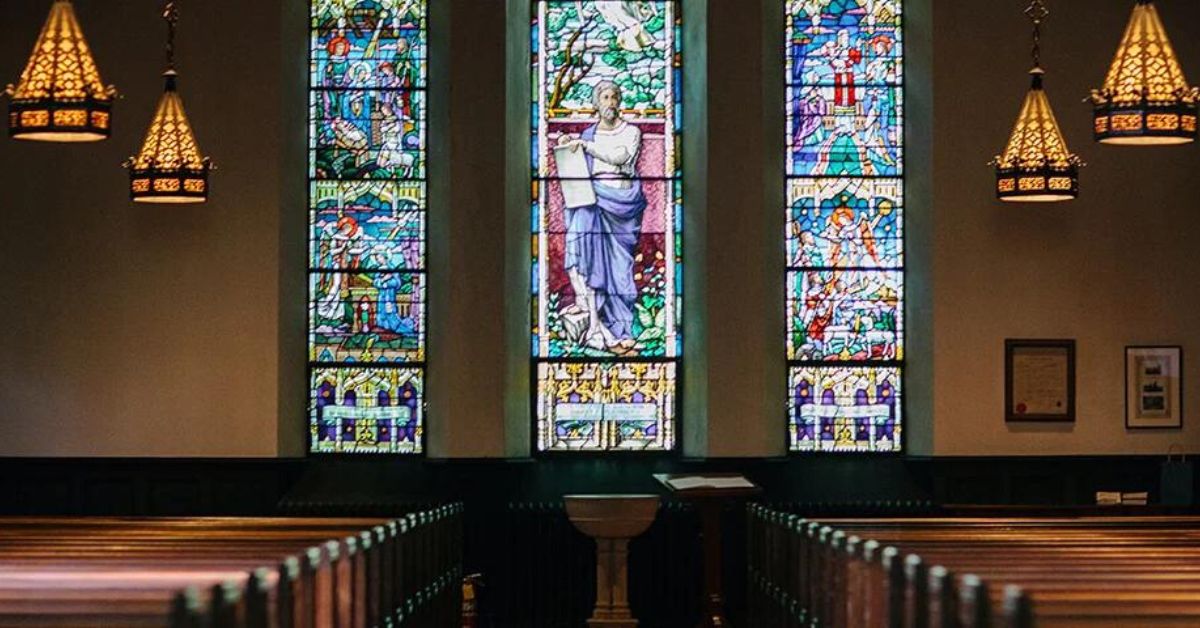 Inside a church with Stain Glass Windows