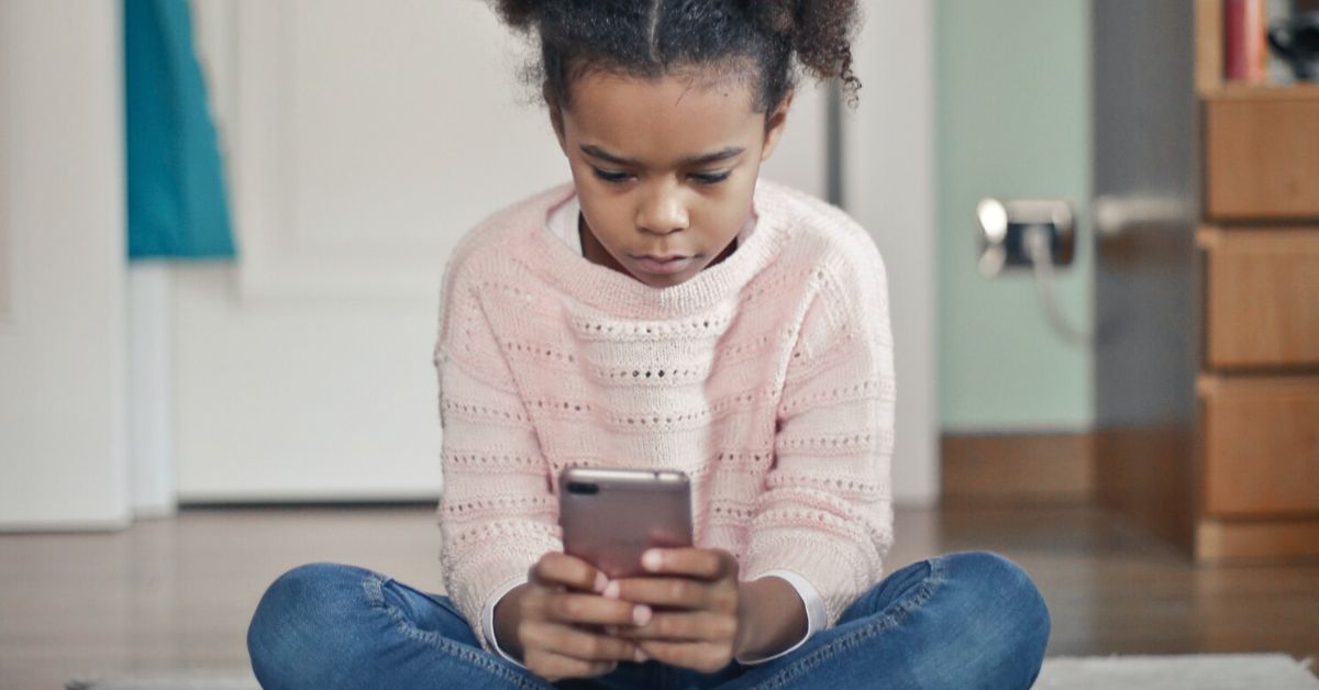 Little girl with smartphone