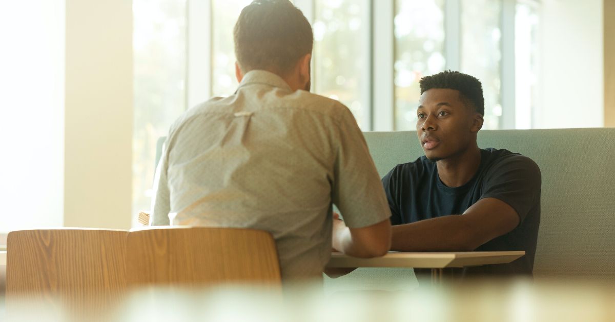 Two young men Conversation