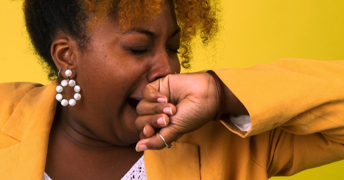 Woman yawning at work