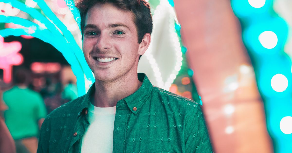 Young man outdoors at night